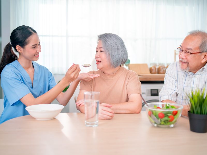 nurse-or-doctor-who-work-as-homecare-staff-help-to-serve-a-spoon-of-mush-rice-to-senior-woman.jpg nurse-or-doctor-who-work-as-homecare-staff-help-to-serve-a-spoon-of-mush-rice-to-senior-woman.jpg